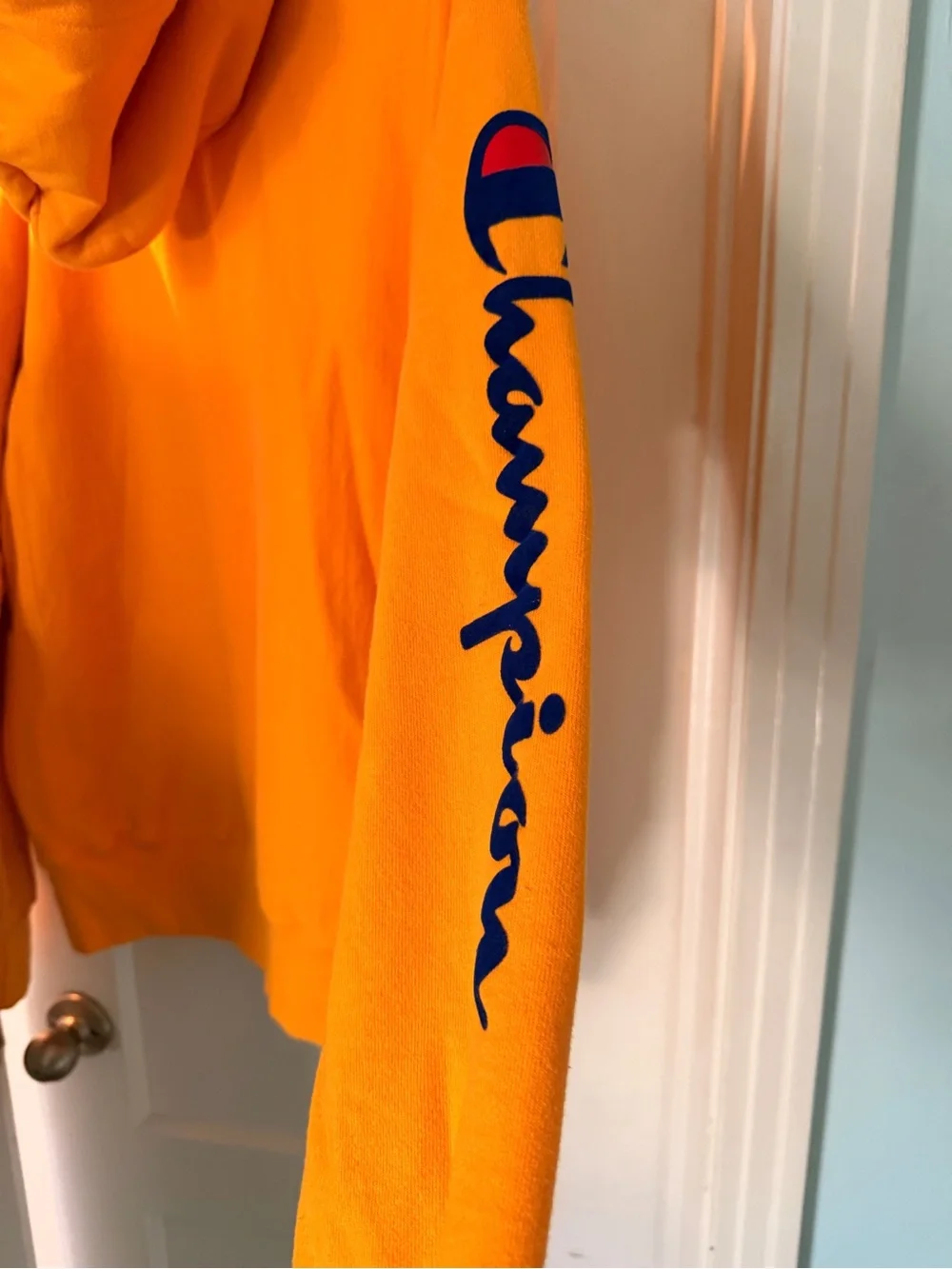 Champion Bright Orange Pullover Hoodie with Sleeve Script excellent condition L